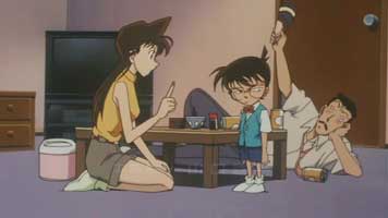 Detective Conan at home from the 4th movie's opening showing Ran Mouri telling conan off, while Kogorou Mouri baps Conan on the head.